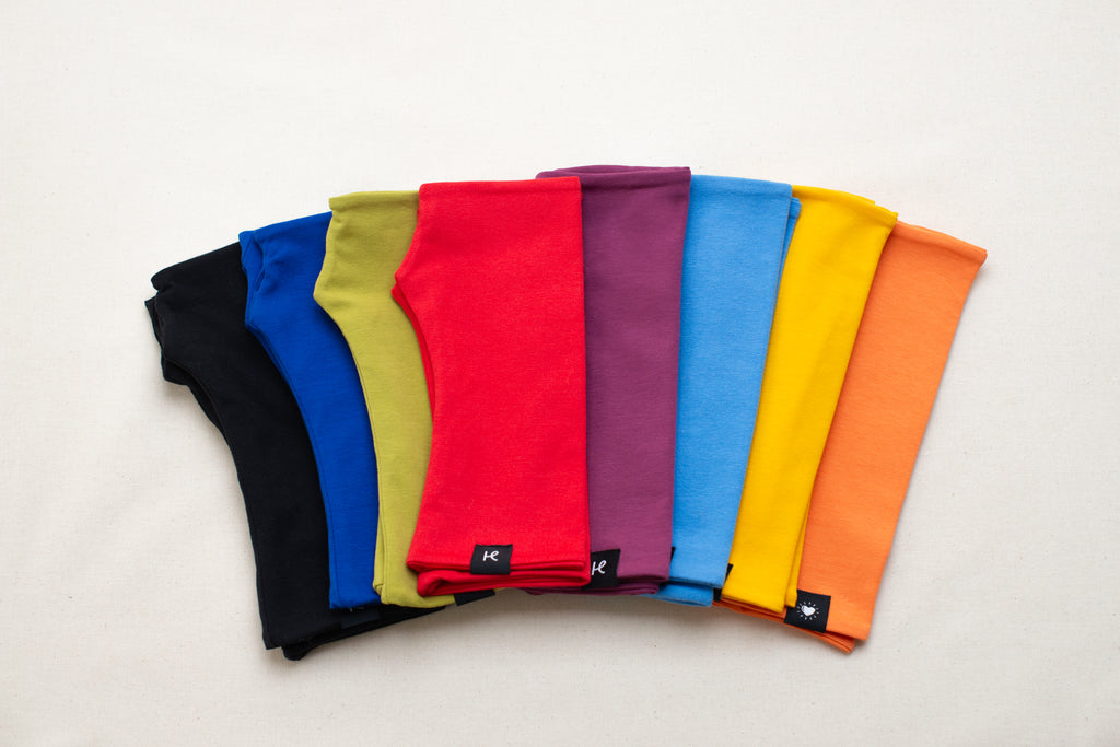 Abanico de color de los mitones de algodón orgánico de Happy Belly