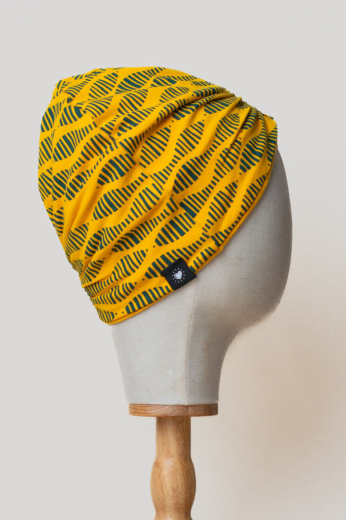Turbante amarillo reversible de algodón orgánico estampado con serigrafía