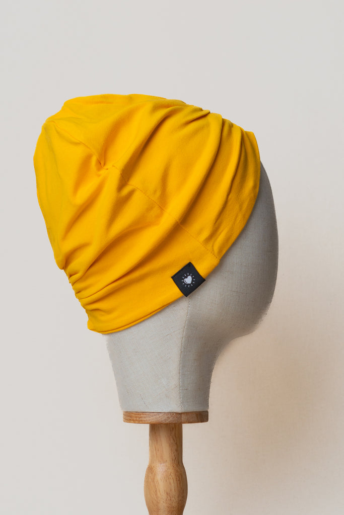 Turbante amarillo de algodón orgánico