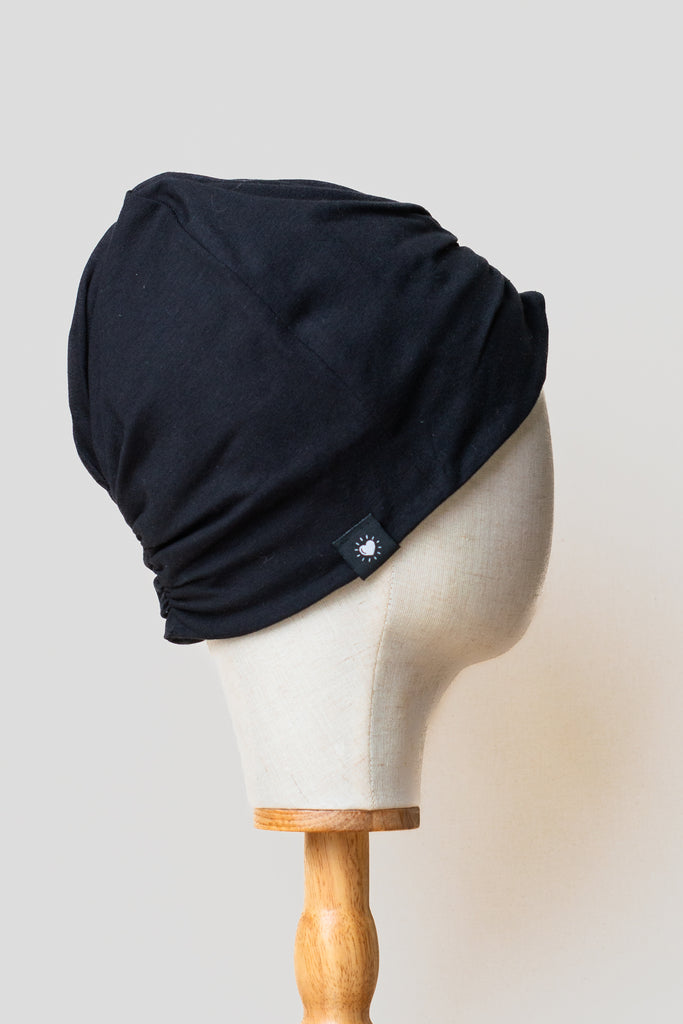 Turbante color negro de algodón orgánico de Happy Belly 