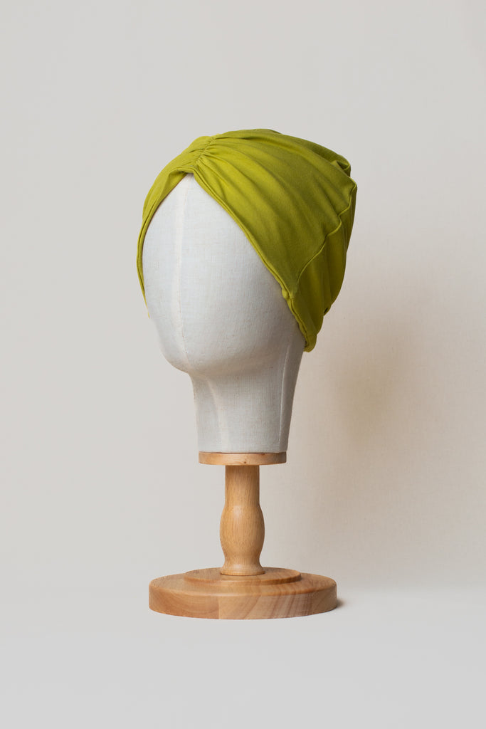 Turbante de color verde lima de algodón orgánico, marca Happy Belly