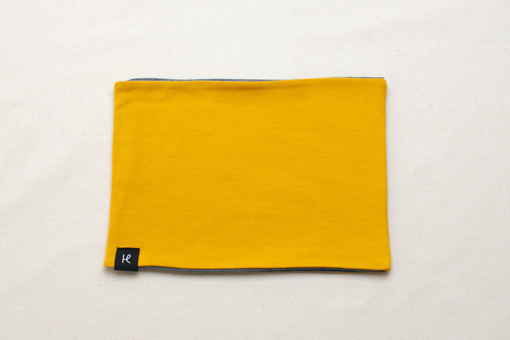 Haramaki infantil reversible amarillo de algodón orgánico marca Happy Belly