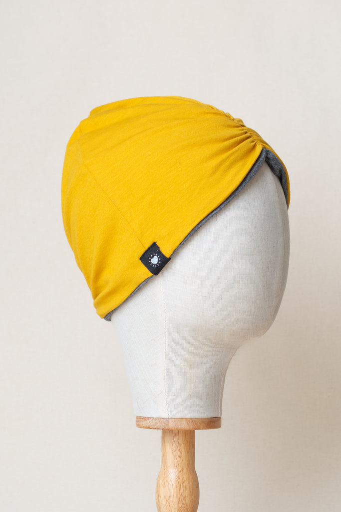 Turbante reversible de algodón orgánico, amarillo y gris